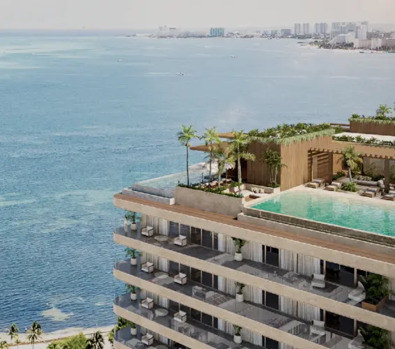 arial drone image of top of condo and ocean