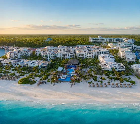arial image of hotel/apartment buildings beside ocean