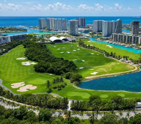 arial drone image of puerto cancun golf course